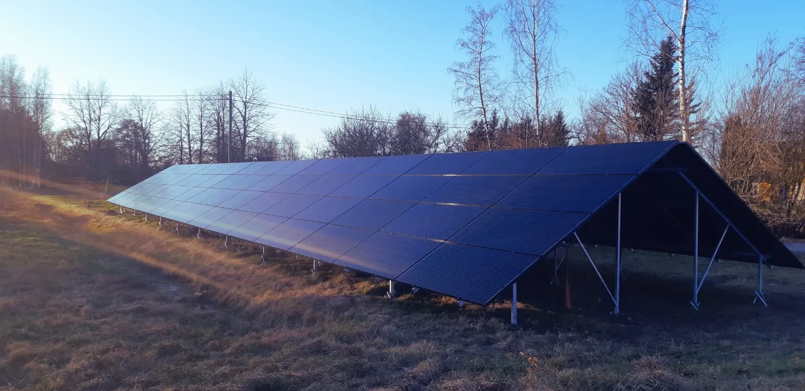 All-black-panel ground-mounted solar park built by Amper ja Volt